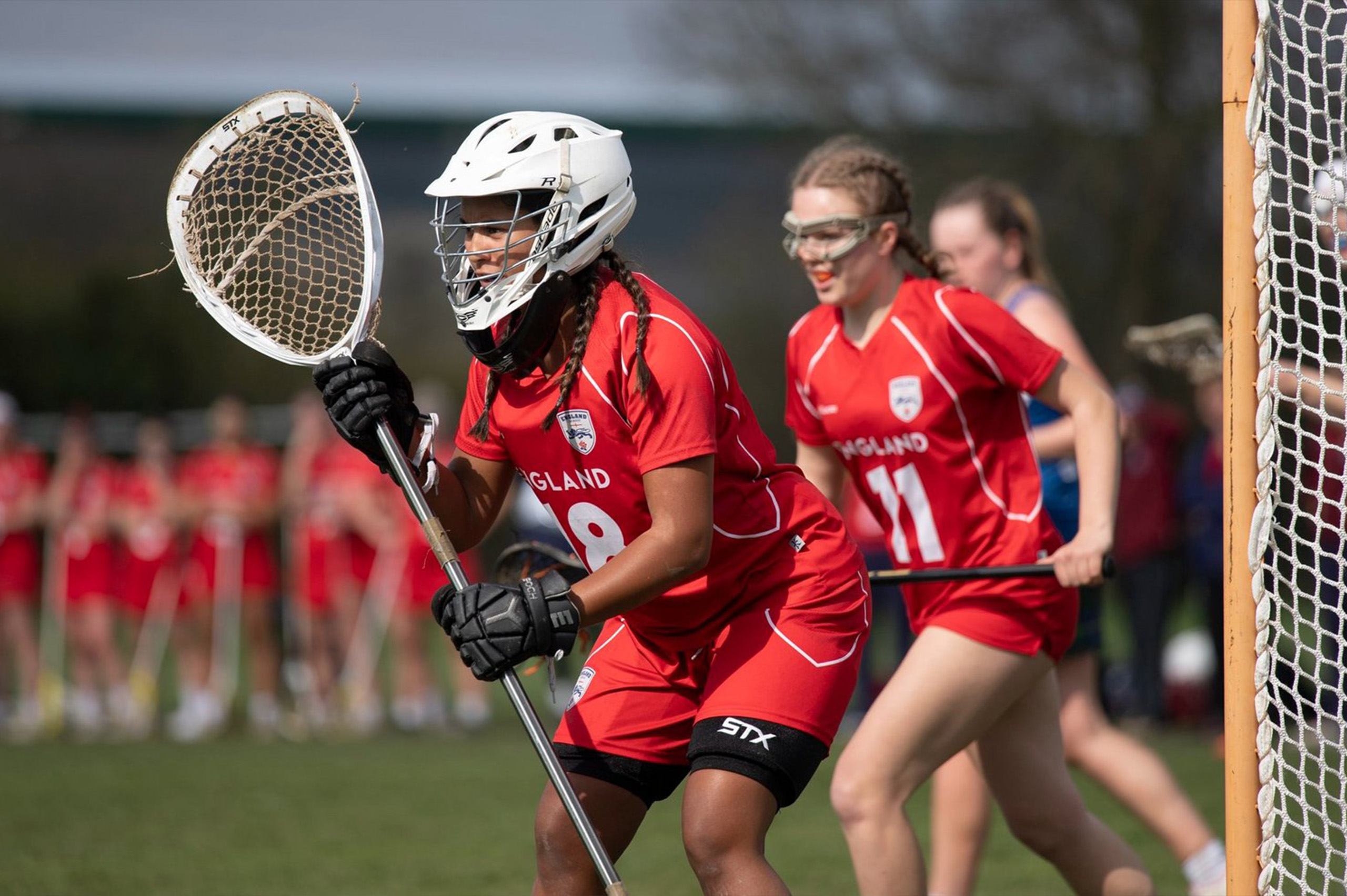 Female England Lacrosse Players Mid Game